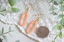 Load image into Gallery viewer, Pink Resin Oval Dangle Earrings
