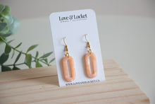 Load image into Gallery viewer, Pink Resin Oval Dangle Earrings
